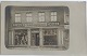 Postkort: Butiksfacade Beklædning fra 1909