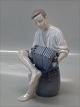 Bing and 
Grondahl B&G 
1661 Merry 
Sailor 22 cm 
Boy with 
accordian 
Marked with the 
three Royal ...