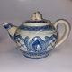 Anders Høy teapot In ceramic. Blue decoration on light brown ground. A little wear here and ...