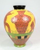 The vase, designed and hand painted by Lene Regius with yellow, orange and green glaze, is an ...