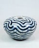 Ceramic vase by 
Per Weiss 
(1953-2023) 
patterned with 
blue and white 
colors from 
around the ...