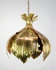 The ceiling lamp, known as "Onion" and created by the renowned designer Sven Aage Holm Sørensen ...