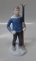 Bing and 
Grondahl B&G 
2358  Boy with 
skis Vita 
Thymann 22 cm 
Marked with the 
three Royal 
Towers ...