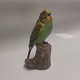 Royal 
Copenhagen 
figure of a 
green parakeet 
in ceramics by 
Jean Grut. 
Model number 
478/3188. In 
...