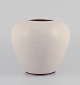 Saxbo, Denmark. Large unique ceramic vase. Glaze in sand tones.Approximately ...