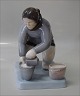 Bing and 
Grondahl B&G 
2416 Inuit 
woman with 
bucket Karl 
Kristoffersen 
22 cm   Marked 
with the ...