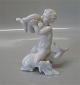 Bing and 
Grondahl B&G 
4061 Girl 
kissing Dolphin 
20 x 17 cm Kai 
Nielsen Marked 
with the three 
...