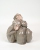 This porcelain 
figure of a 
sleeping monkey 
is a charming 
and delicate 
piece of art 
made with the 
...