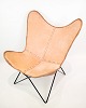The description of this lounge armchair, also known as the bat chair, highlights its unique ...