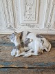 Royal 
Copenhagen 
figurine - cow 
with calf 
No. 800, 
Factory first 
Height 12.5 
cm. Length 26.5 
...