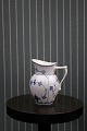 Royal 
Copenhagen Blue 
Fluted Plain 
cream jug. H: 
10cm. 
Decoration 
number: 1/60. 
1.sort. Is ...