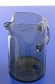 Presumably 
Holmegaard 
Glasworks, 
Smoke-coloured 
glass, ice 
water jug, 19.5 
cm. Capacity 
180.0 ...