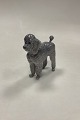 Royal 
Copenhagen 
Figurine Poodle 
No. 4757. 
Designed by 
Jeanne Grut. 
1st Quality 
Measures 12 
...