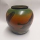 Ceramic vase from Peter Ipsen. Motif in relief with two flying ducks. Appears in good condition. ...