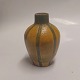 Orange vase In ceramics with decoration of green vertical stripes by the Danish potter Karl ...