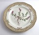 Royal 
Copenhagen 
Flora Danica. 
Lunch plate 
with open-work 
border. Design 
# 3554. 
Diameter 23 cm. 
...