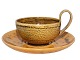 Kähler art 
pottery, yellow 
tea cup with 
high handle and 
matching 
saucer.
The cop 
measures 9.9 
...