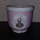 Pink painted 
porcelain 
flower pot from 
the end of the 
19th century, 
with a painted 
portrait of ...