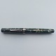 12-sided green 
marbled 
Wahl-Eversharp 
Doric fountain 
pen with 
leverfiller. In 
good condition 
...