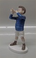 Bing and 
Grondahl B&G 
1792 Boy with 
trumpet M. 
Ahlmann 18 cm 
Marked with the 
three Royal 
Towers ...