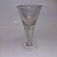 18 cm high wine 
glass. Air 
bubbles in the 
stem, including 
an oblong 
discoloration 
in the stem ...