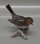 Bing and 
Grondahl Bird 
B&G 2311 Robin 
on twig SJ 9 cm 
Sven Jespersen 
Marked with the 
three Royal ...