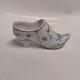 Blue fluted 
shoe in 
porcelain. From 
around 1920. 
Supposed to be 
made in 
Germany. In 
good ...