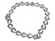 N.E. From sterling silver, modern necklace from around 1950 to 1960.Hallmarked "N.E. FROM ...