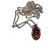 Niels P. Design, small amber pendant set in silver with necklace.Hallmarked “NP 925S". Niels ...