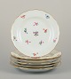 Meissen, 
Germany.
Six dinner 
plates in 
porcelain.
Hand-painted 
with polychrome 
floral motifs, 
...