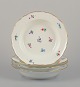 Meissen, 
Germany.
A set of four 
deep plates in 
porcelain.
Hand-painted 
with polychrome 
floral ...