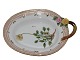 Royal 
Copenhagen 
Flora Danica, 
dish with 
handle.
Decoration 
number 20/3540. 

The factory 
...