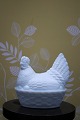 Old egg hen in white glass. 
H:13.5cm. L:14cm.
Nice to serve a few boiled eggs in...