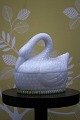 Rare, old swan in white glass. 
Great for storing small items in the kitchen or simply as decoration...