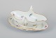 Meissen, 
Germany, sauce 
boat on foot.
Hand-painted 
with polychrome 
floral motifs, 
gold ...