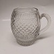Glass mug with 
handle. 
Decorated with 
alibings and 
shield for text 
from central 
Europe 
(possibly ...