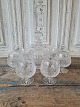 Set of 6 cognac 
glasses and 
carafe in cut 
crystal 
Height of 
carafe 22 cm. 
Height of 
glass 11 cm.