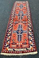 Hand-knotted 
rug, 20th 
century 291 x 
76 cm.
