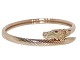 Georg Jensen & 
Wendel 18 carat 
gold bracelet 
shaped as a 
horse and with 
two red rubies 
as the ...