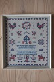 An antique Sampler, handmade embroider, in the 
original frame
Please contact us for translation of the text
1833-1874
Measure incl. the frame: 38cm x 34,5cm
In a good condition
