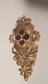 12k gold
 Brooch with 
garnets
 length 3.3 cm
 Width 1.6 cm
$: 226