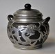 Chinese sugar 
bowl in 
stoneware with 
pewter 
mounting. 
Approx. 1930. 
Decoration with 
dragons. ...