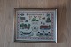 A beautiful sampler, embroidery made by hand from 
Sønderjylland, Dänemark
With Schackenborg and Graasten Slot (Castle)
43cm x 53,5cm
In the original frame
We have a large choice of samplers, embroider 
Please contact us for further information