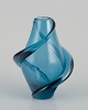 Scandinavian 
glass artist. 
Handmade art 
glass vase in 
turquoise 
glass.
1970s.
Perfect ...