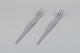 Arne Jacobsen for Georg Jensen. Modernist AJ flatware.
Two long salad forks in stainless steel.