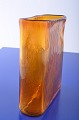 Amber colored 
glass vase with 
fluted basin, 
width 19.5 x 7 
cm. 7 11/16 x 2 
3/4 Height 21 
cm. 8 ...