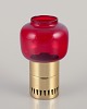 Hans-Agne 
Jakobsson for 
A/B Markaryd.
Candlestick 
holder in brass 
and red art 
glass.
For tea ...