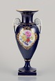 Meissen, 
Germany. 
Porcelain vase 
in Sevres Bleu.
Polychrome 
flower motifs. 
Gold ...