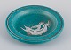 Wilhelm Kåge 
for 
Gustavsberg, 
"Argenta" 
ceramic bowl on 
four feet.
Green glaze 
decorated with 
a ...