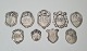 Lot of 9 coat 
shield in 
silver 
Stamped: 830s 
- 826s